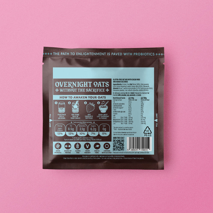 Package of oat cult overnight gut oats cacao ingredients with a pink background