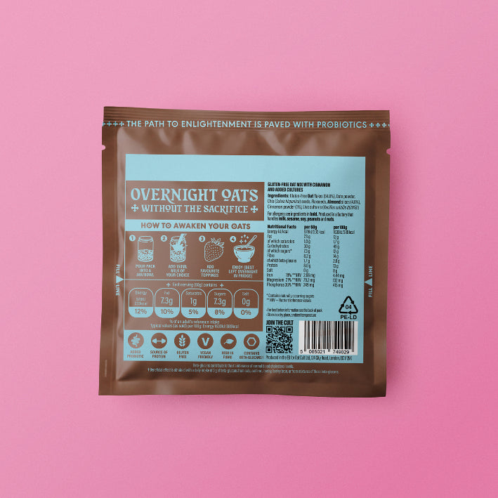 Package of oat cult overnight  gut oats  cinnamon ingredients with a pink background